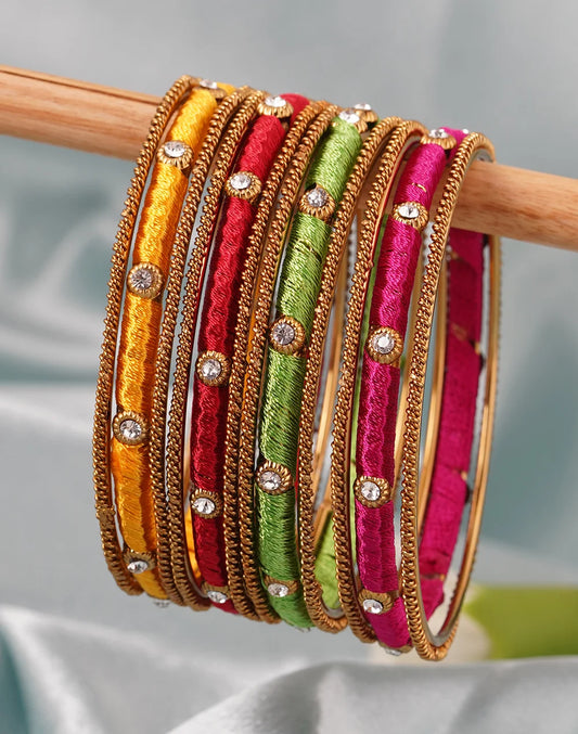 Set Of 12 Multicolour Stones Gold Plated Silk Thread Bangles