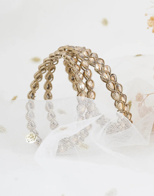 pair of 4 gold plated stone bangles