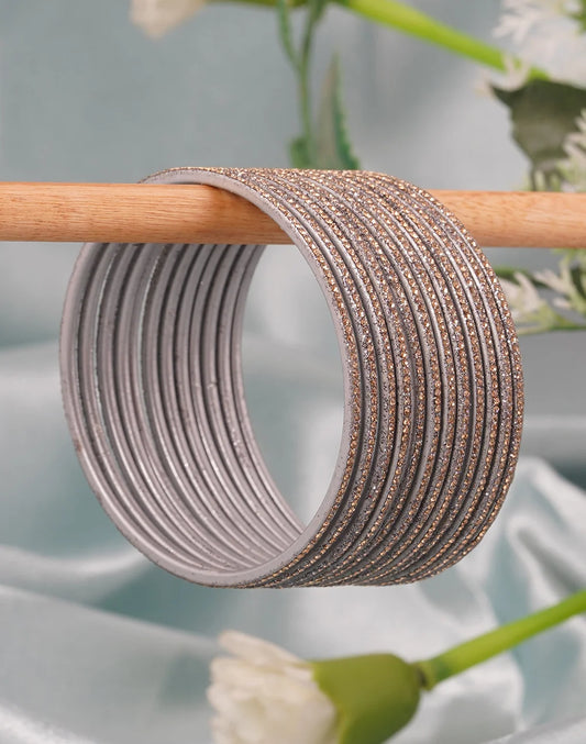 Set Of 12 golden gemstone silver metal base bangle