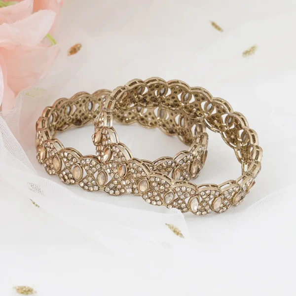 Gold-plated Kundan studded alloy antique bangles